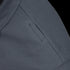 Close-up of the Condor Short Sleeve Performance Tactical Polo in dark gray, featuring a small rectangular welt pocket and visible stitching—designed for durability, ideal for First Responder or Military uniforms.